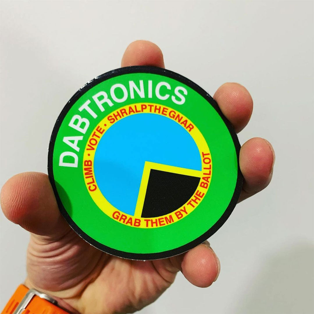 Gloss finish custom circle sticker close up showing high-impact shiny surface