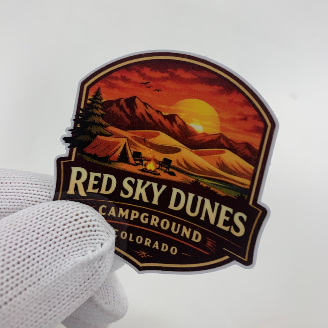 Custom die cut sticker featuring a Red Sky Dunes Campground Colorado vintage outdoor design.
